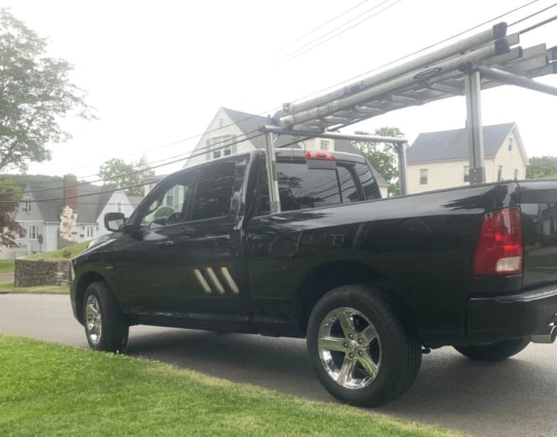 Fleet vehicle cleaning service being performed by Brunswick Power Washing in Brunswick